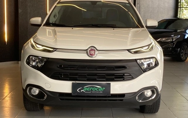 imagem-https://www.socarrao.com.br/sc-vehicle-images-prod/1010522/1776363085152-640_480_fiat-toro-freedom-1-8-at6-4x2-flex-18-19-b7986a-11.jpg