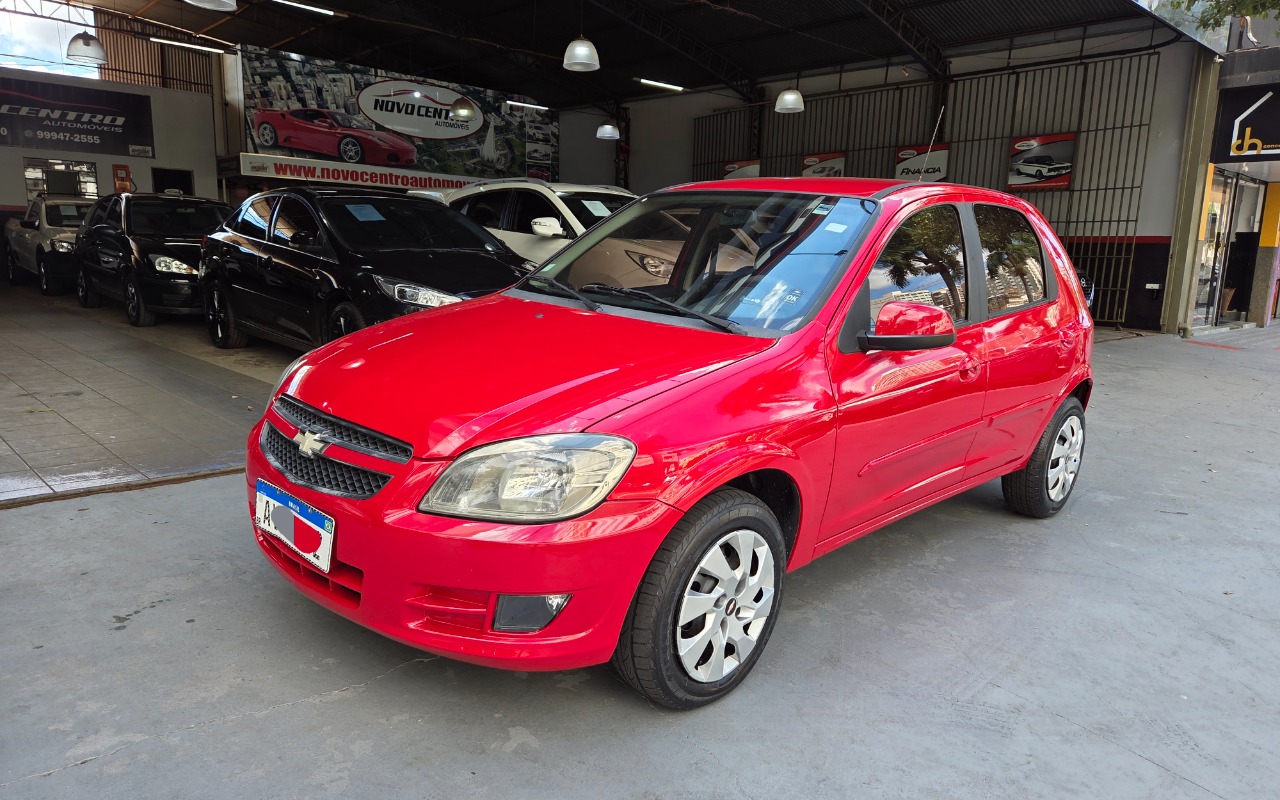 Chevrolet Celta Spirit/ LT 1.0 MPFI 8V FlexP. 5p na cor Vermelho em Maringá / PR - 1028346