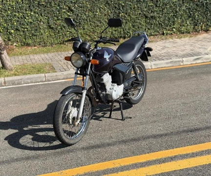 Honda CG 125 FAN ES 2011 Roxo — foto 1 de 3