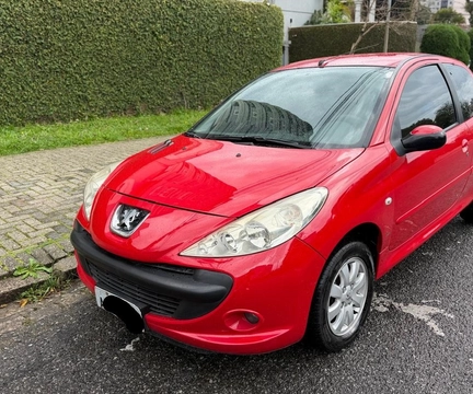 Peugeot 207 2009 Vermelho — foto 1 de 3