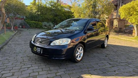imagem-https://www.socarrao.com.br/sc-vehicle-images-prod/3451243/1787744658979-toyota-corolla-1.8-seg-16v-gasolina-4p-automatico-wmimagem08585509646.jpg