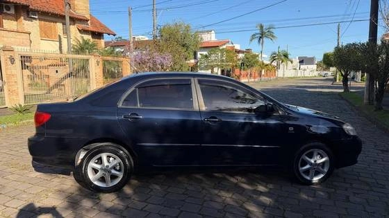 imagem-https://www.socarrao.com.br/sc-vehicle-images-prod/3451243/1787744658983-toyota-corolla-1.8-seg-16v-gasolina-4p-automatico-wmimagem08585560374.jpg