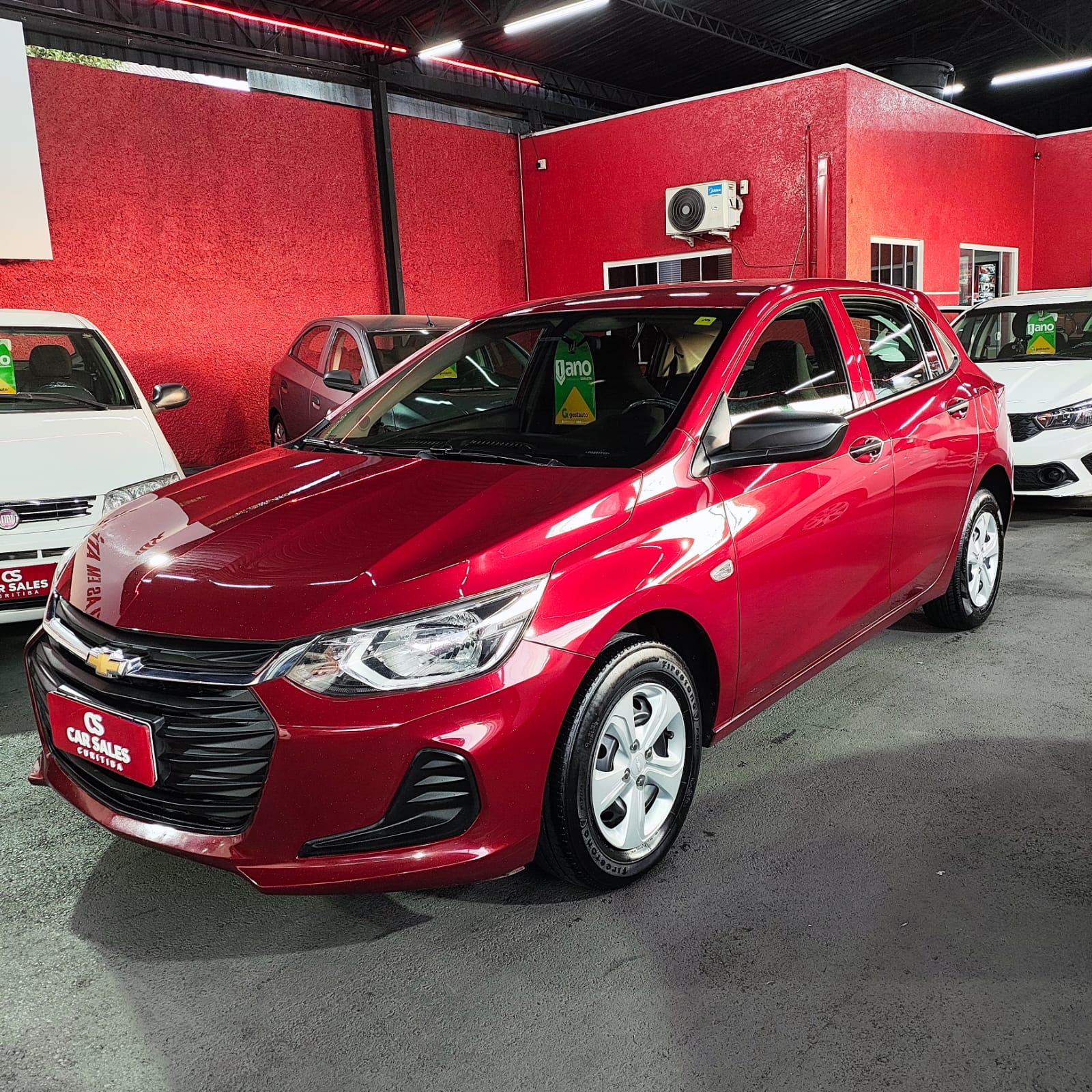 Chevrolet Onix 2023 Vermelho — foto 1 de 3