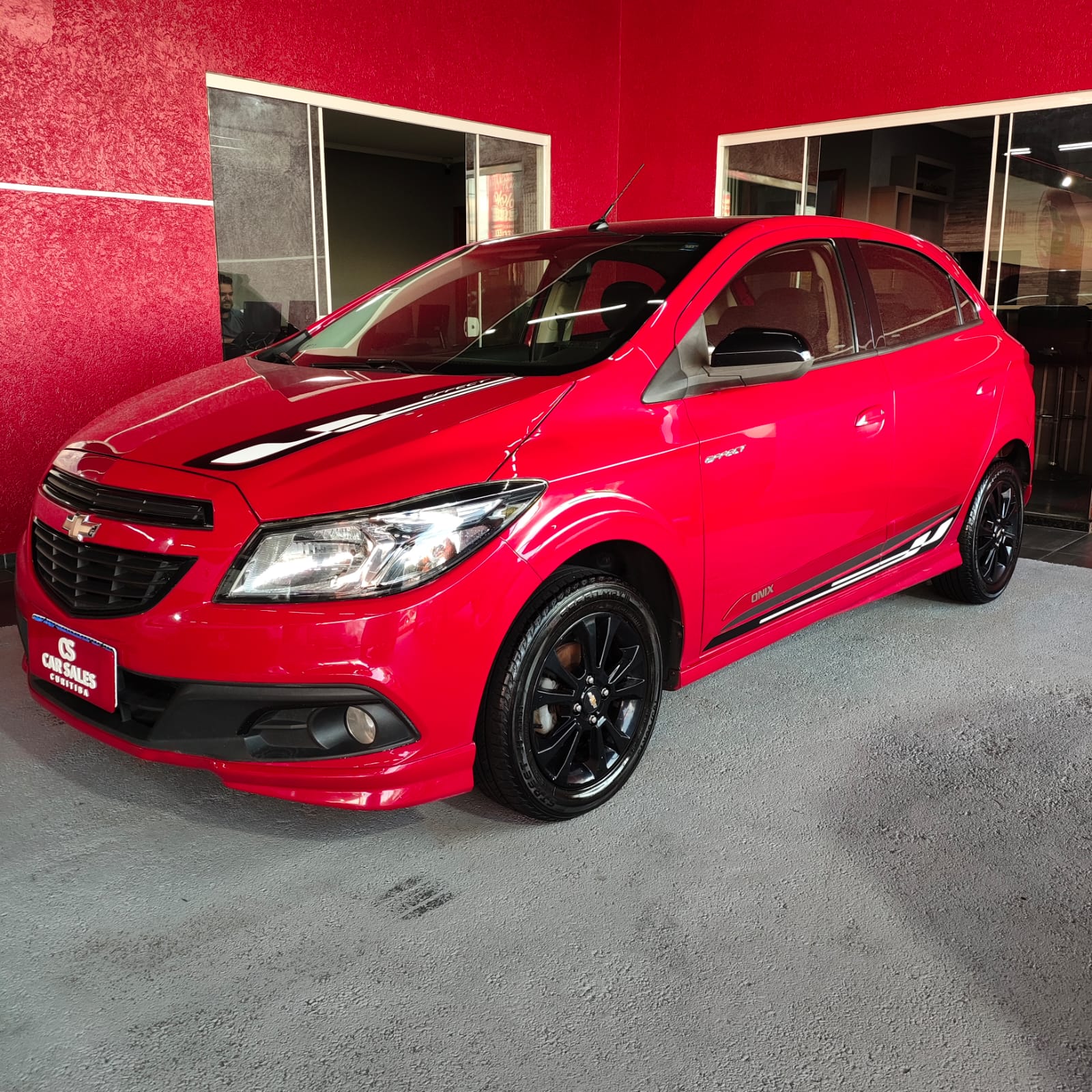 Chevrolet Onix 2015 Vermelho — foto 1 de 3