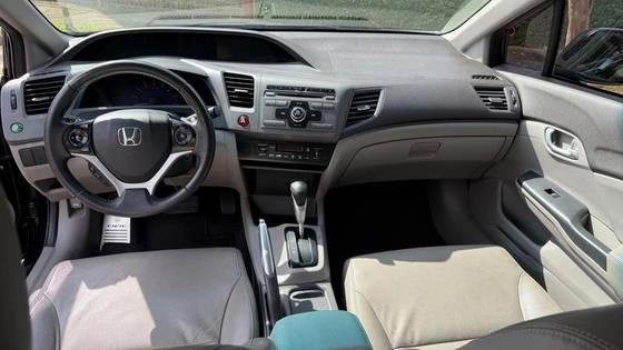 imagem-https://www.socarrao.com.br/sc-vehicle-images-prod/4025107/1790076621110-honda-civic-2.0-lxr-16v-flex-4p-automatico-wmimagem08241154622.jpg