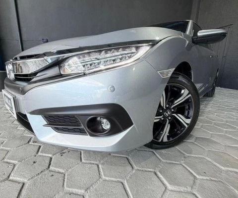 imagem-https://www.socarrao.com.br/sc-vehicle-images-prod/4027369/1790081898559-640_480_honda-civic-1-5-touring-turbo-cvt-17-17-b5d806-24.jpg