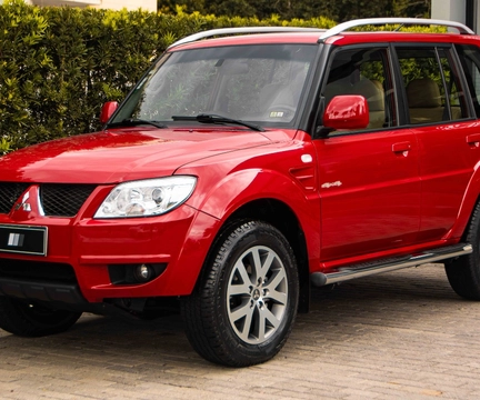 Mitsubishi Pajero TR4 2015 Vermelho — foto 1 de 3