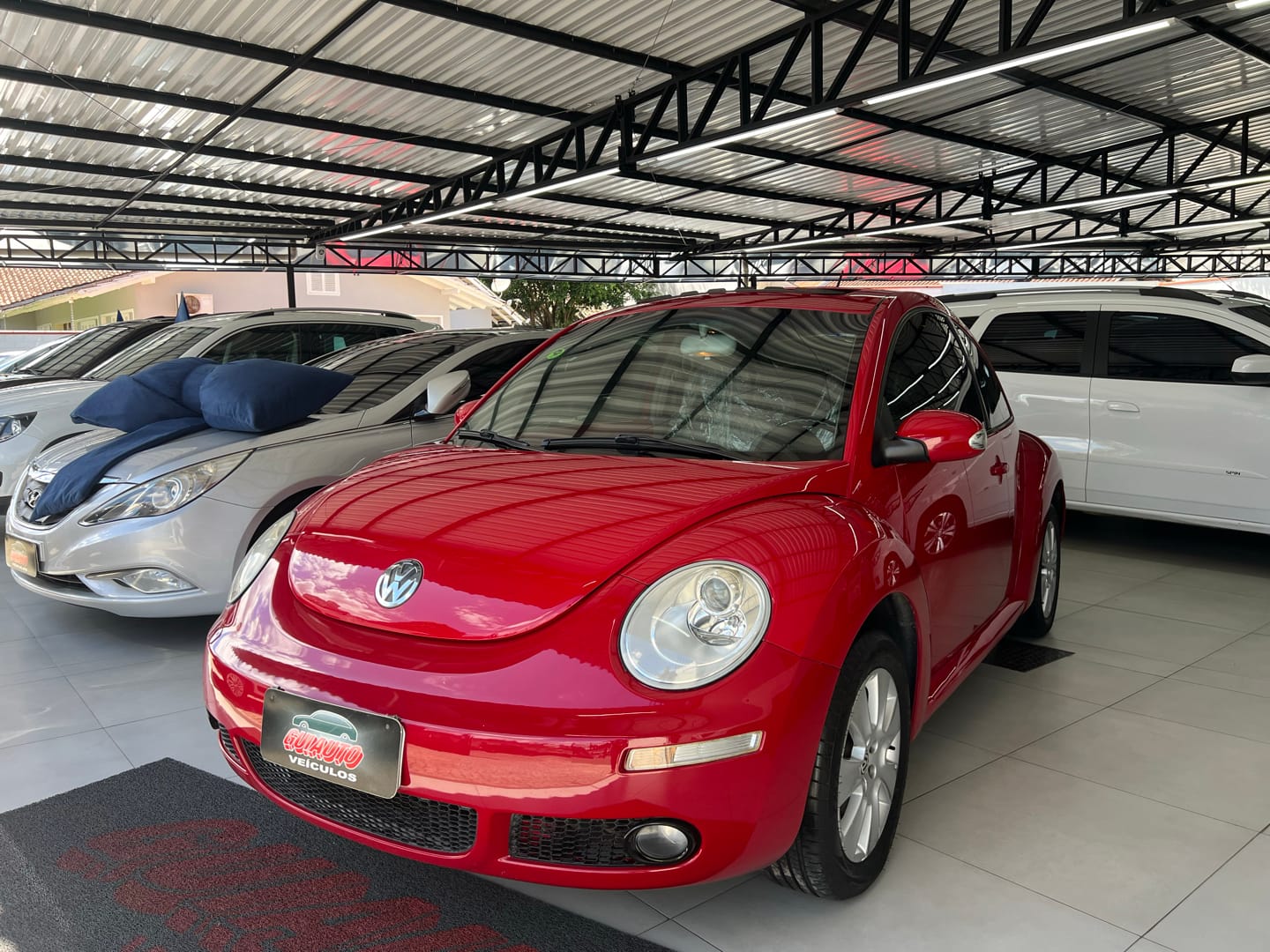 Volkswagen New Beetle 2.0 Mi Mec./Aut. 2010 Vermelho — foto 1 de 3
