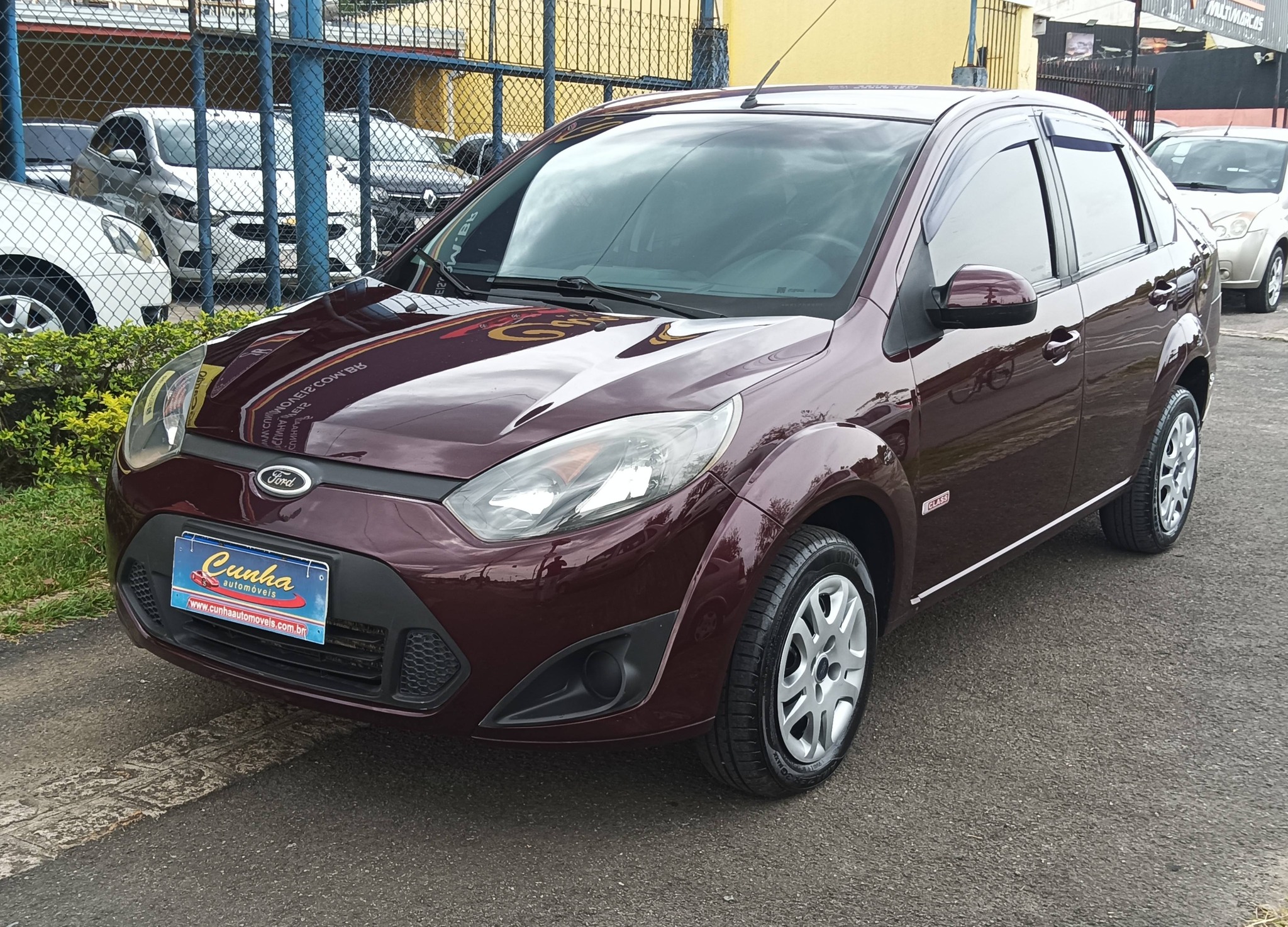 Ford Fiesta Sed. 1.6 8V Flex 4p na cor Vermelho em Curitiba / PR - 51765