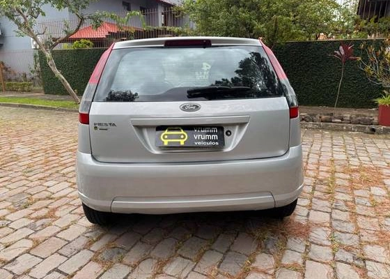 imagem-https://www.socarrao.com.br/sc-vehicle-images-prod/923683/1773401617177-ford-fiesta-1.0-rocam-s-8v-flex-4p-manual-wmimagem15392687359.jpg
