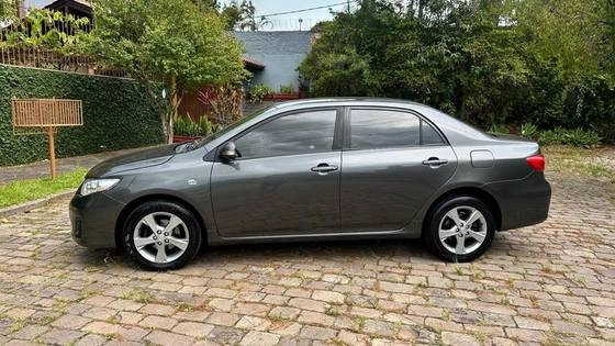 imagem-https://www.socarrao.com.br/sc-vehicle-images-prod/923694/1776166087440-toyota-corolla-1.8-gli-16v-flex-4p-automatico-wmimagem10195638564.jpg