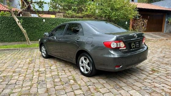imagem-https://www.socarrao.com.br/sc-vehicle-images-prod/923694/1776166087441-toyota-corolla-1.8-gli-16v-flex-4p-automatico-wmimagem1019571737.jpg