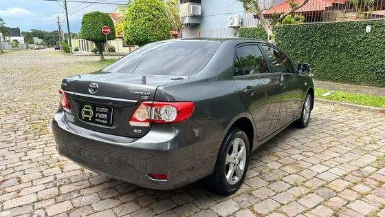 imagem-https://www.socarrao.com.br/sc-vehicle-images-prod/923694/1776166087442-toyota-corolla-1.8-gli-16v-flex-4p-automatico-wmimagem10195880012.jpg