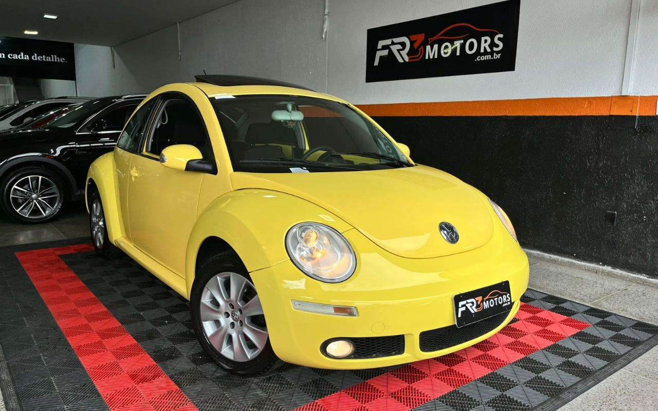 Volkswagen New Beetle 2.0 Mi Mec./Aut. na cor Amarelo no Gravataí / RS - 968854